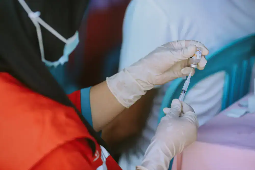 Patient undergoing medical check-up in Singapore with blood testing