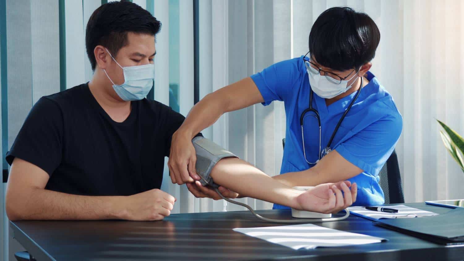 Employees participating in corporate health screening at a workplace in Singapore
